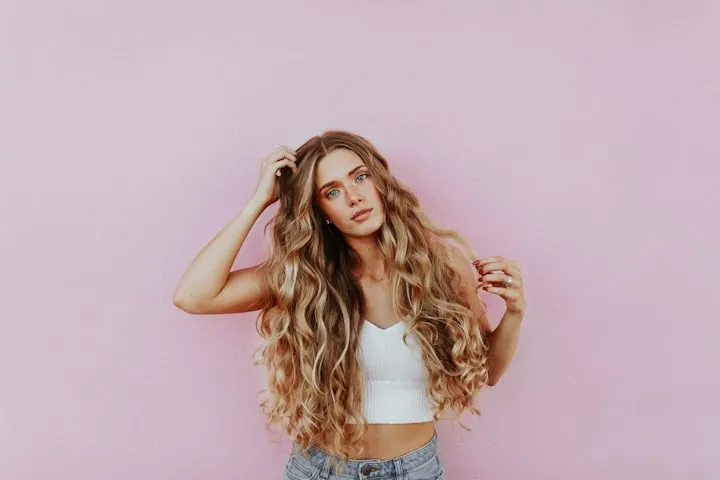 Woman with curly hair laughing