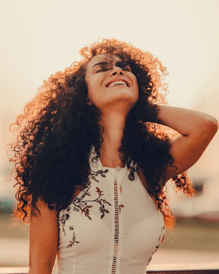 Woman tossing her curls